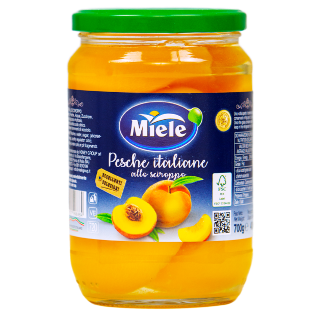 Jar of Miele Italian peach preserve on a white background